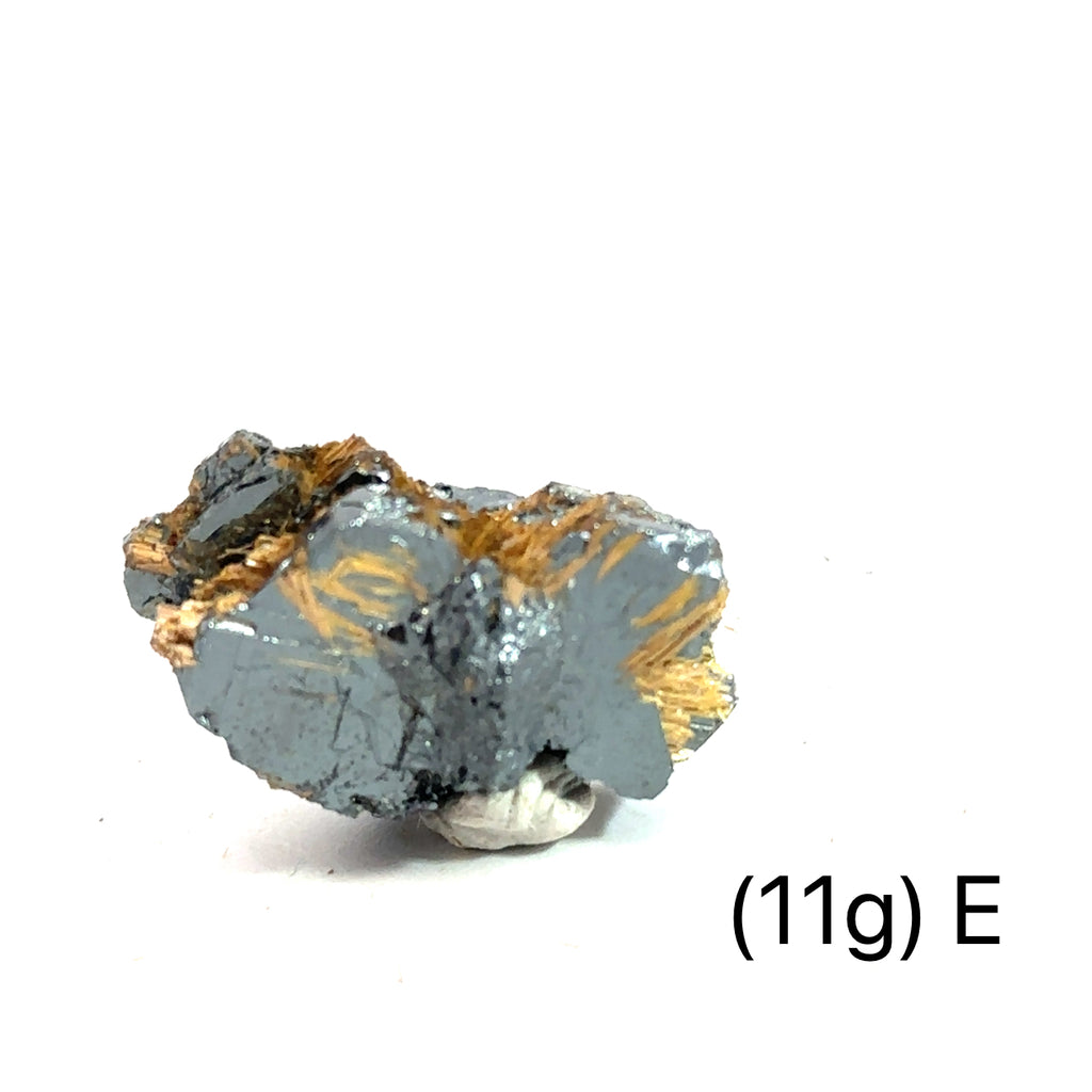 Golden Rutile with Hematite Raw Gemstone (11g) E on white overview