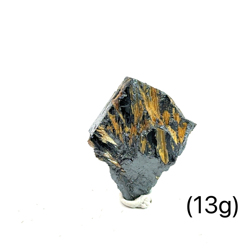 Golden Rutile with Hematite Raw Gemstone (13g )  on white overview