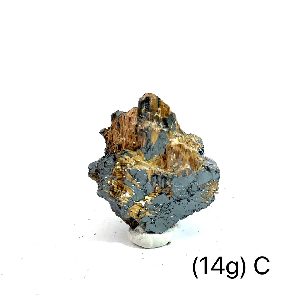 Golden Rutile with Hematite Raw Gemstone (14g ) C on white overview
