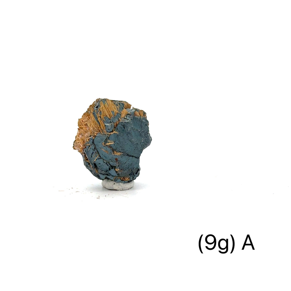 Golden Rutile with Hematite Raw Gemstone (9g)A on white overview