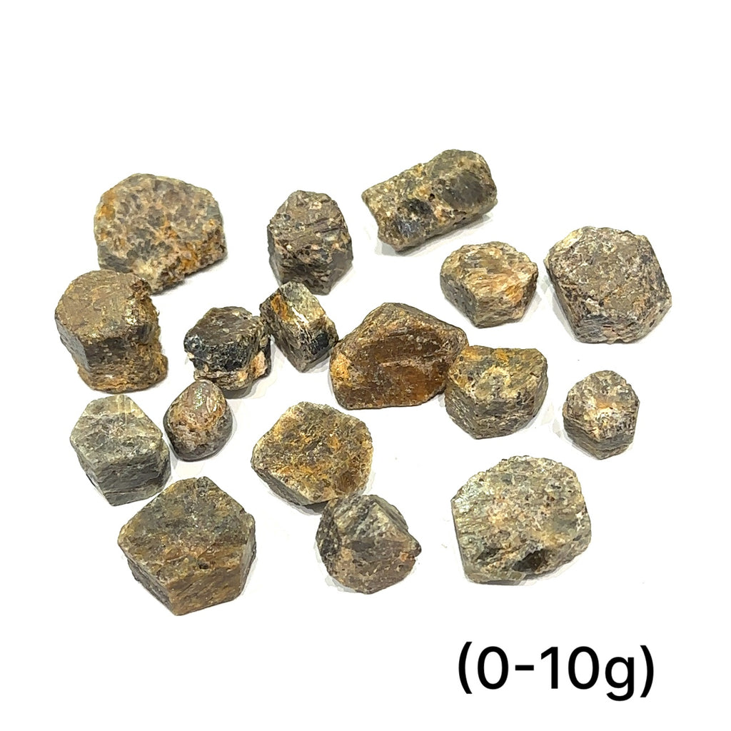 Golden Sapphire raw gemstone with bronze-golden sheen symbolizing strength and prosperity grouping of (0-10g) on white overview