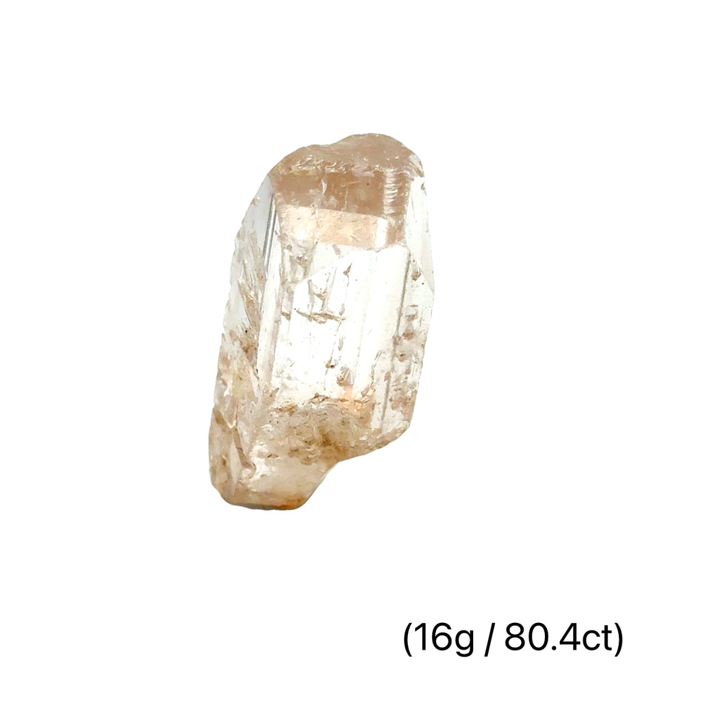 Golden Topaz Gemstone 16g /80.4ct on white front view 