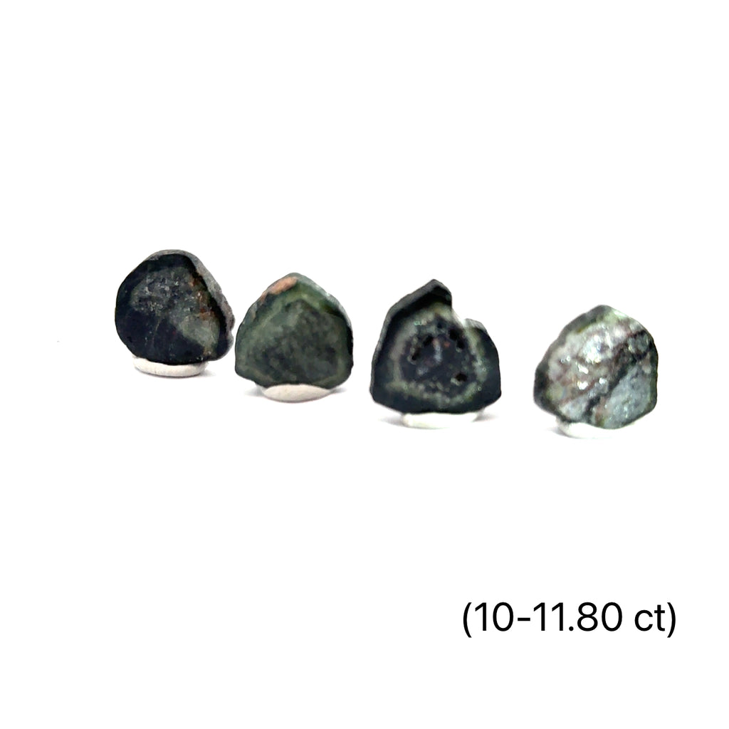 Green Tourmaline Slice grouping 10-11.80ct on white front view