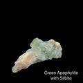Green apophyllite with silbite crystal on a black background
