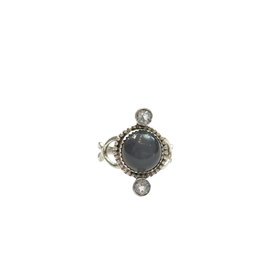 Grey moonstone and blue topaz sterling silver ring, 10mm cabochon center stone, heart-shaped bezel setting, size 6.25, intuition jewelry, on a white background, front view. 
