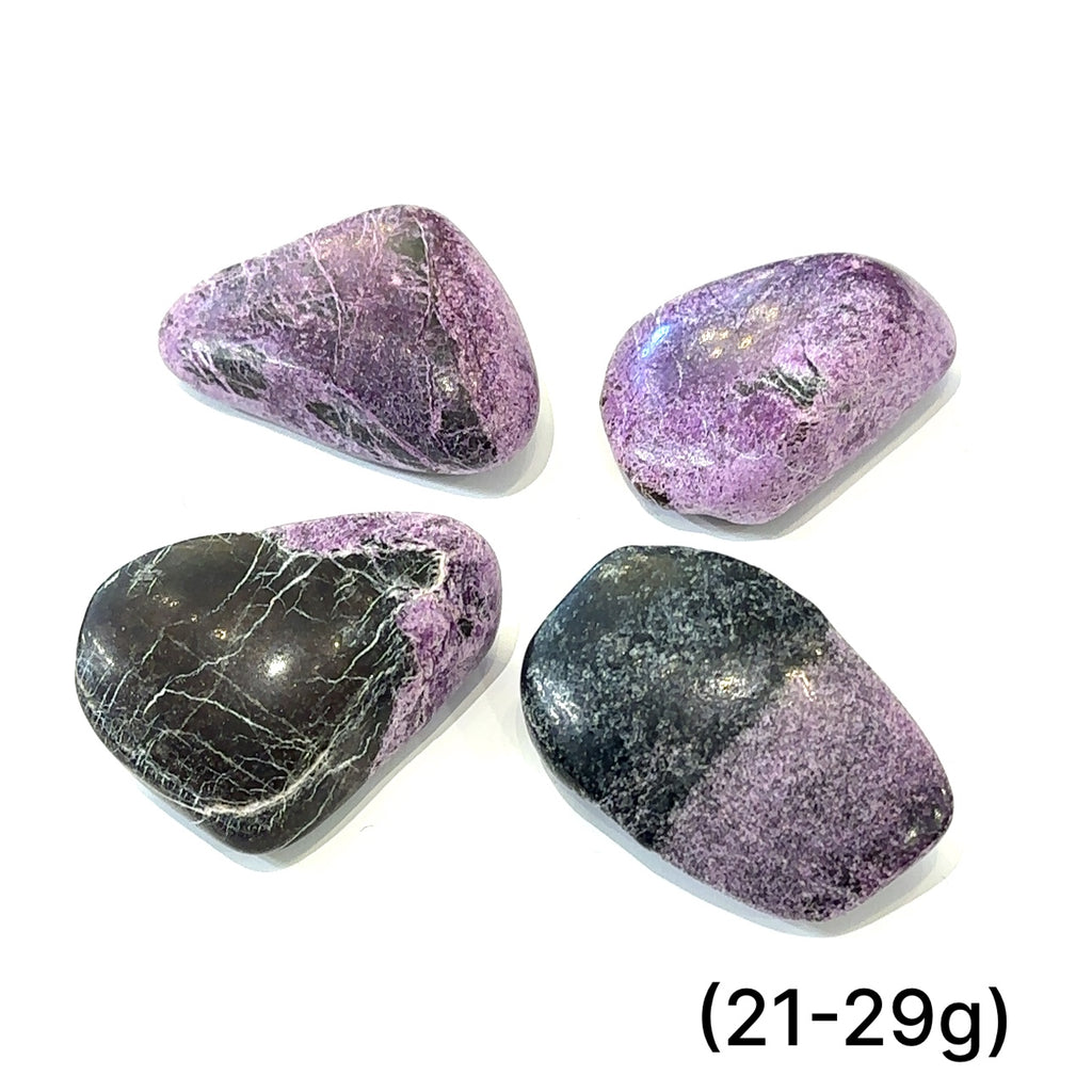 Group of Stichtite stones with calming purple hues representing emotional healing and transformation (21-29g) on white overview