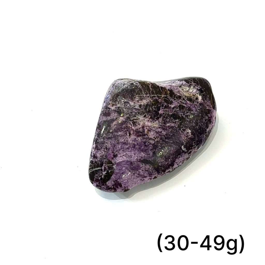 Group of Stichtite stones with calming purple hues representing emotional healing and transformation (30-49g) on white overview