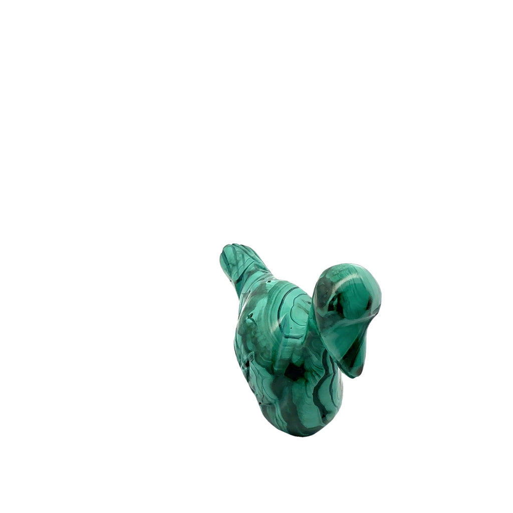 Hand-carved crystal ducky made from malachite– healing stone for joy and creativity on white background front view