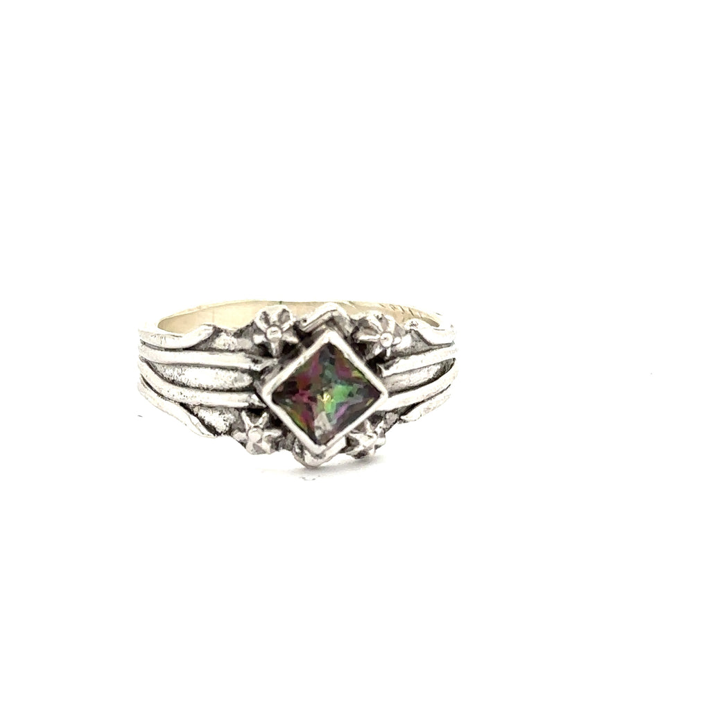 Hand-forged sterling silver Mystic Topaz ring with square faceted gemstone, size 8.25 on white front view