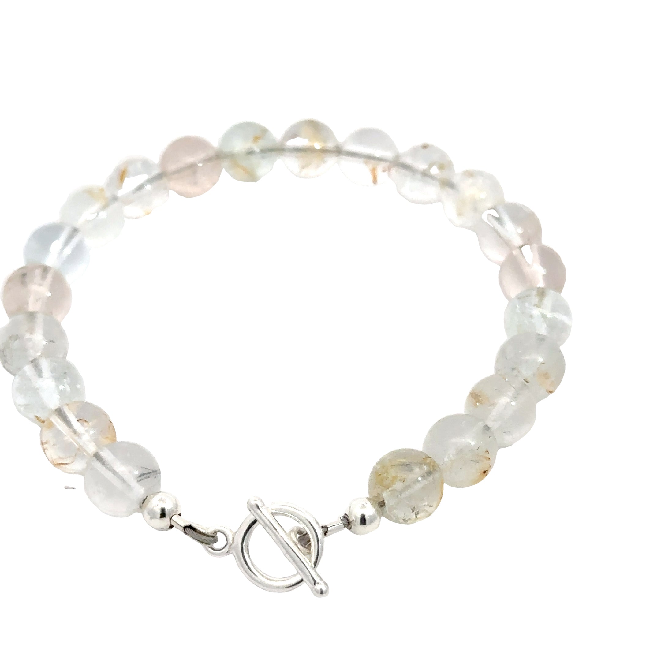 Hand‑crafted Blue Topaz bracelet with Beadlon wire and positive intentions on white backside overview