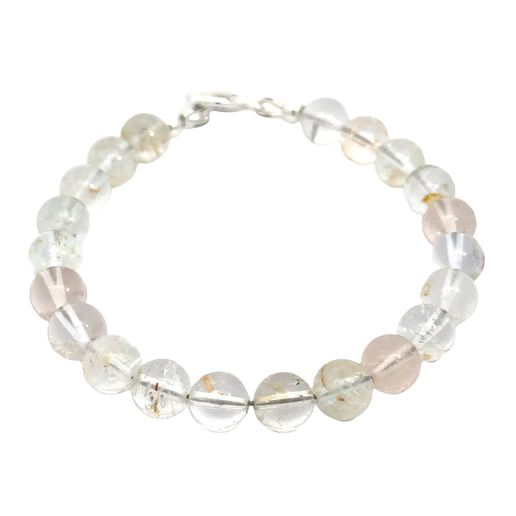 Hand‑crafted Blue Topaz bracelet with Beadlon wire and positive intentions on white front overview