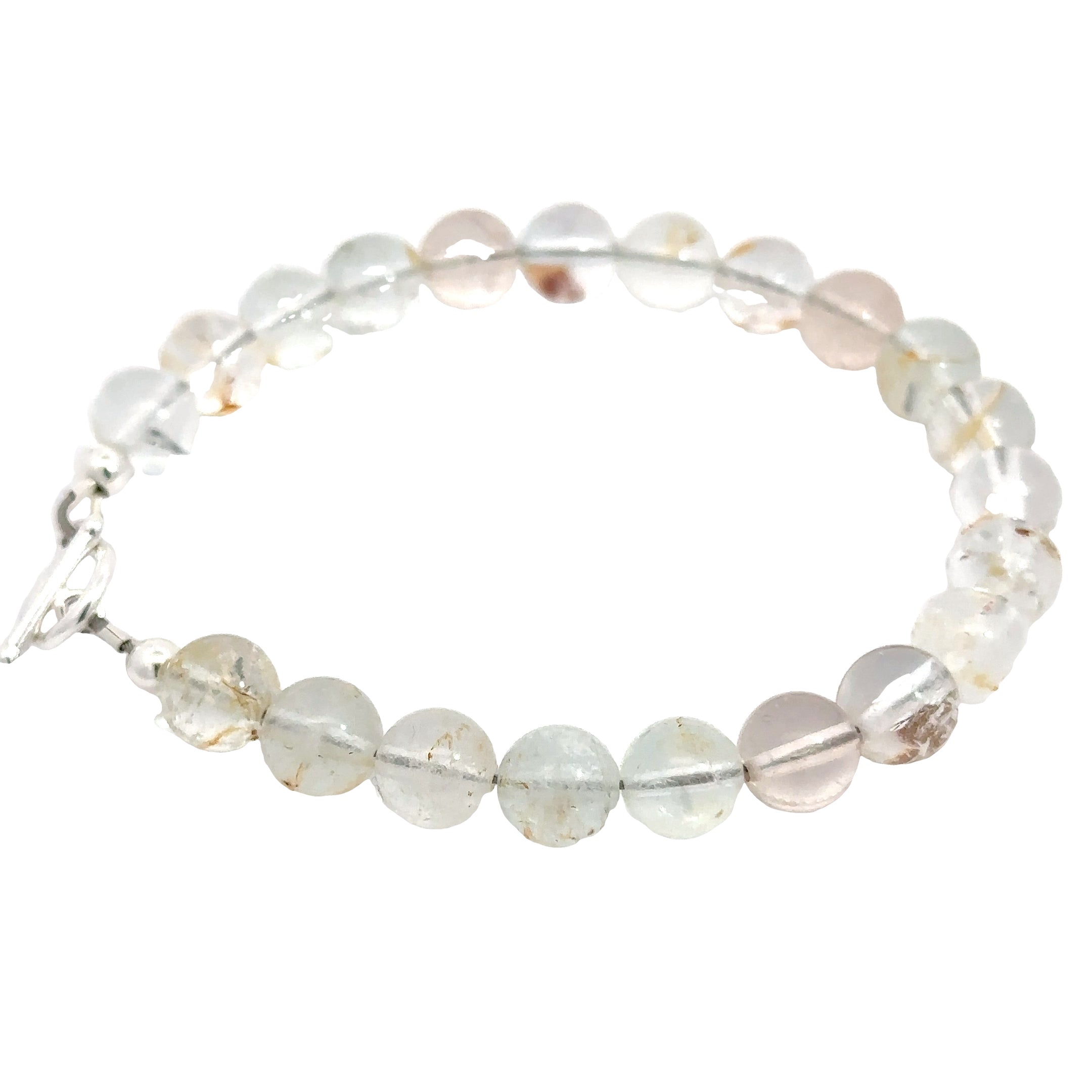 Hand‑crafted Blue Topaz bracelet with Beadlon wire and positive intentions on white left side close up overview