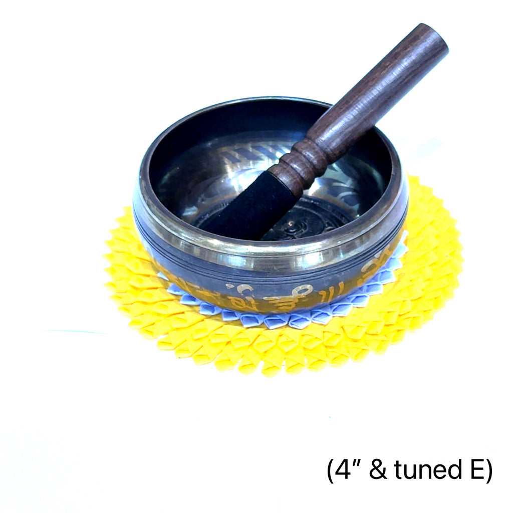 Hand‑selected Himalayan singing bowl for sound healing and chakra balancing on white (4'' and tuned to E) front bowl view