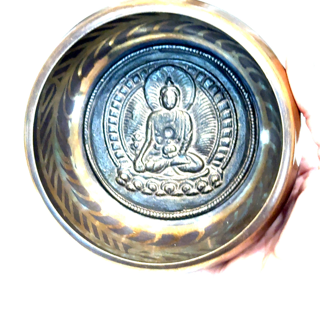 Hand‑selected Himalayan singing bowl for sound healing and chakra balancing on white (5'' and tuned to B) inside the singing bowl view