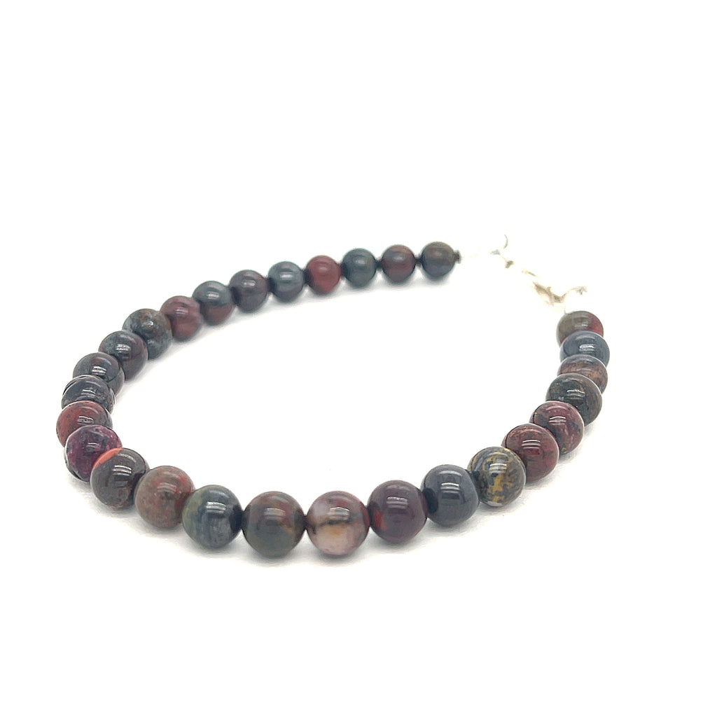 Handcrafted Brecciated Jasper crystal bracelet for clarity, peace, balance, and grounding on white front left  angle overview
