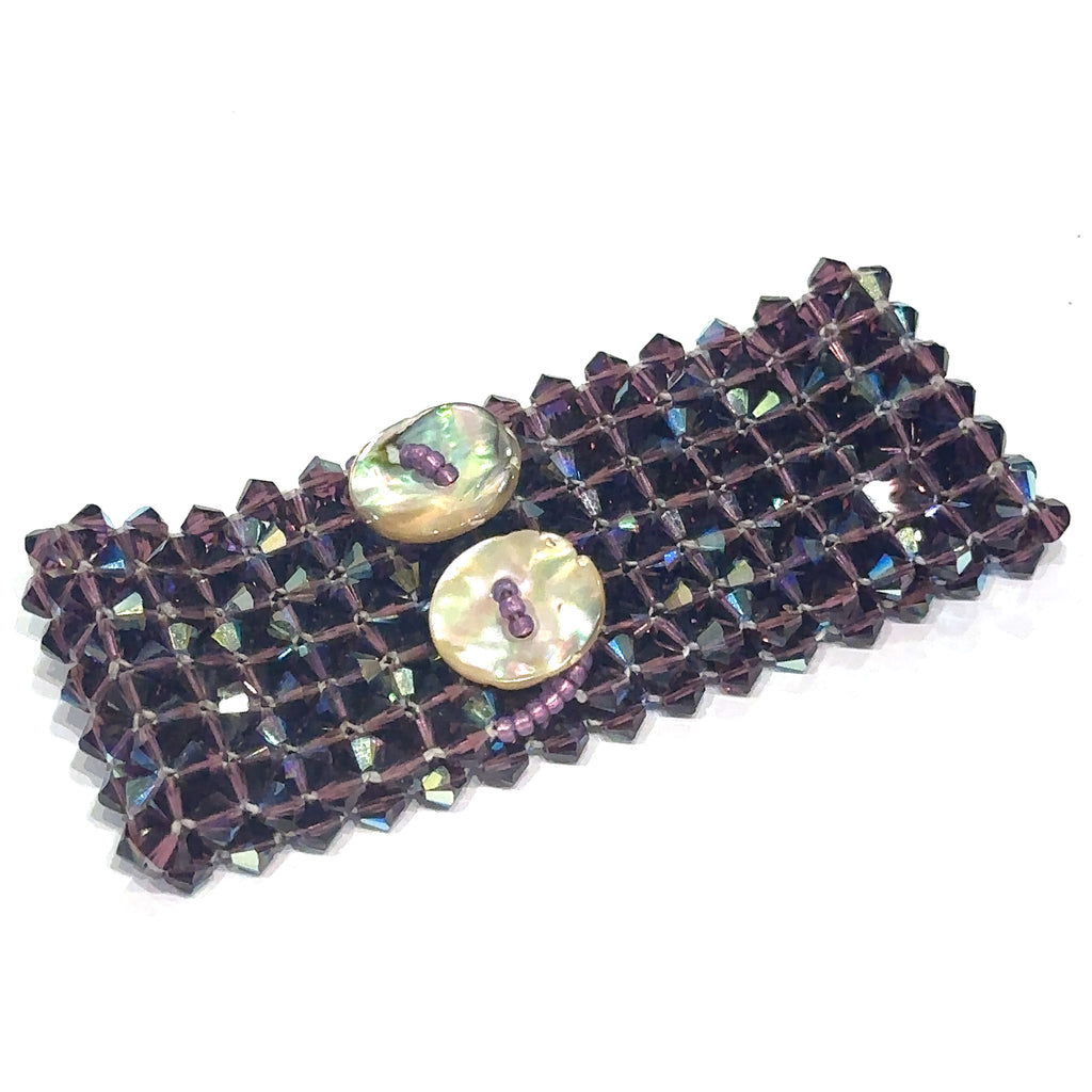 Handcrafted purple crystal cuff bracelet for glamour, intuition, and self‑expression on white view of flat back button view