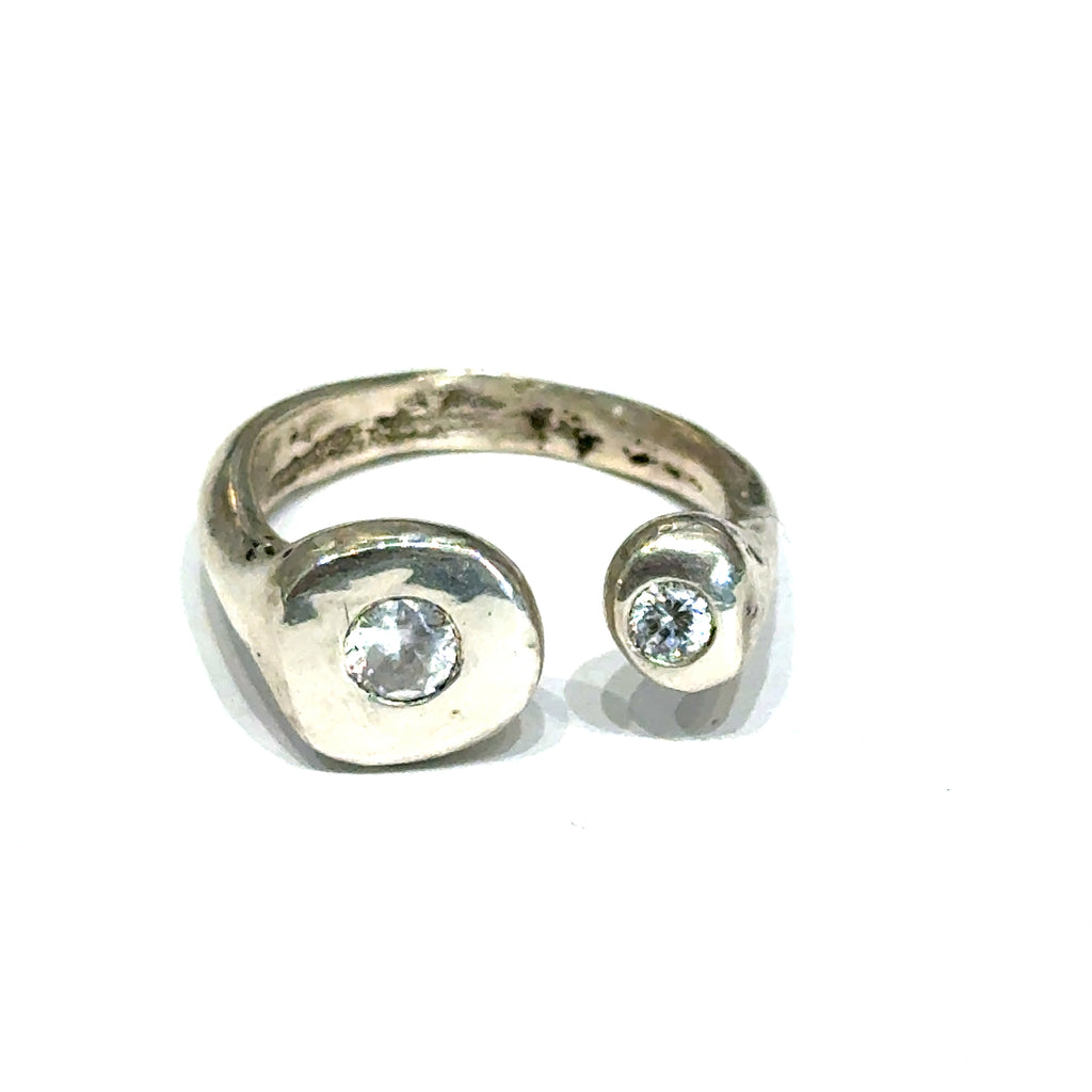 Handcrafted sterling silver bubble ring with clear CZ accents — open shank design on a white background front overview.