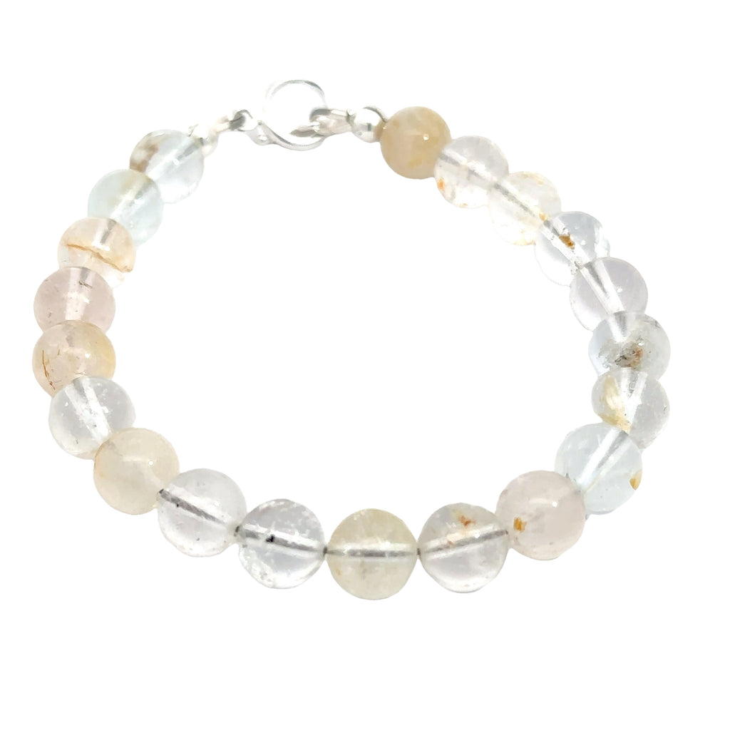 Handmade Blue Topaz gemstone bracelet with sterling silver toggle clasp, November birthstone jewelry on white front overview