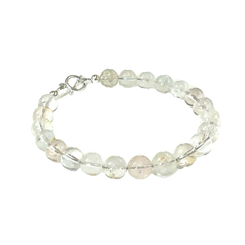 Handmade Blue Topaz gemstone bracelet with sterling silver toggle clasp, November birthstone jewelry on white front view