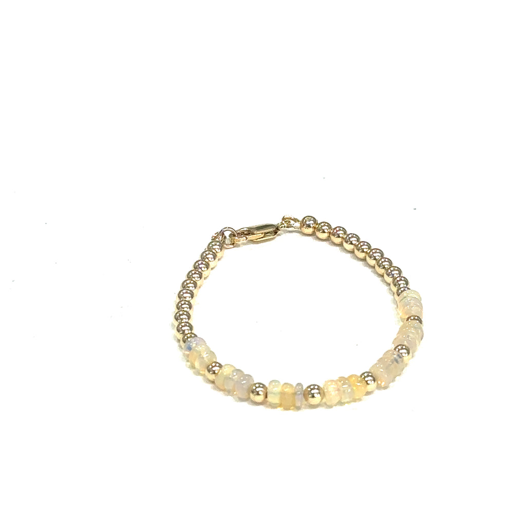 Handmade Ethiopian Opal bracelet perfect for stacking or everyday wear (gold filled beads & opal ) on white front view 