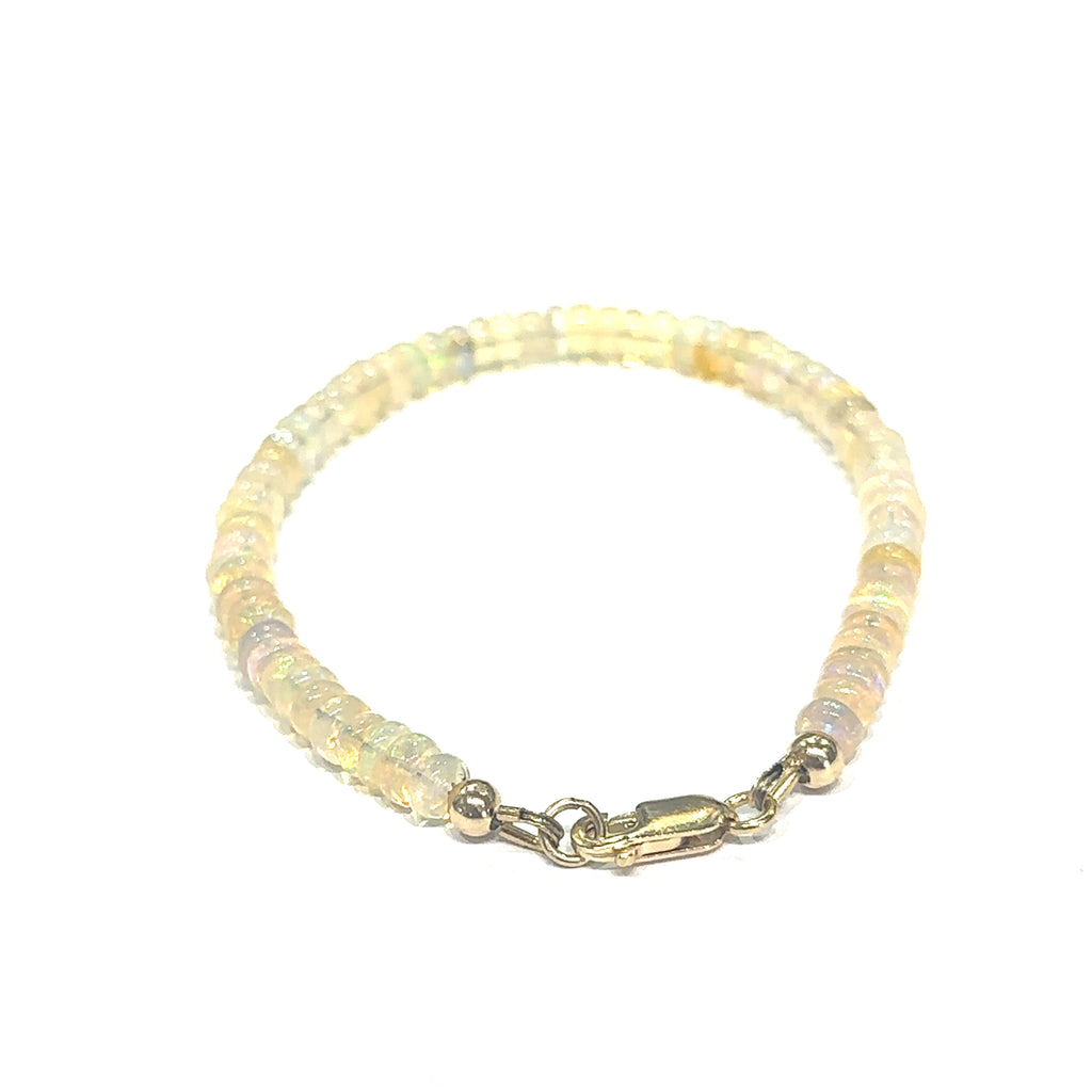 Handmade Ethiopian Opal bracelet perfect for stacking or everyday wear on white back view 