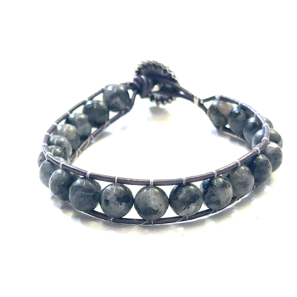 Handmade dark brown leather Chan‑Luu style bracelet with Larvikite beads on white front view
