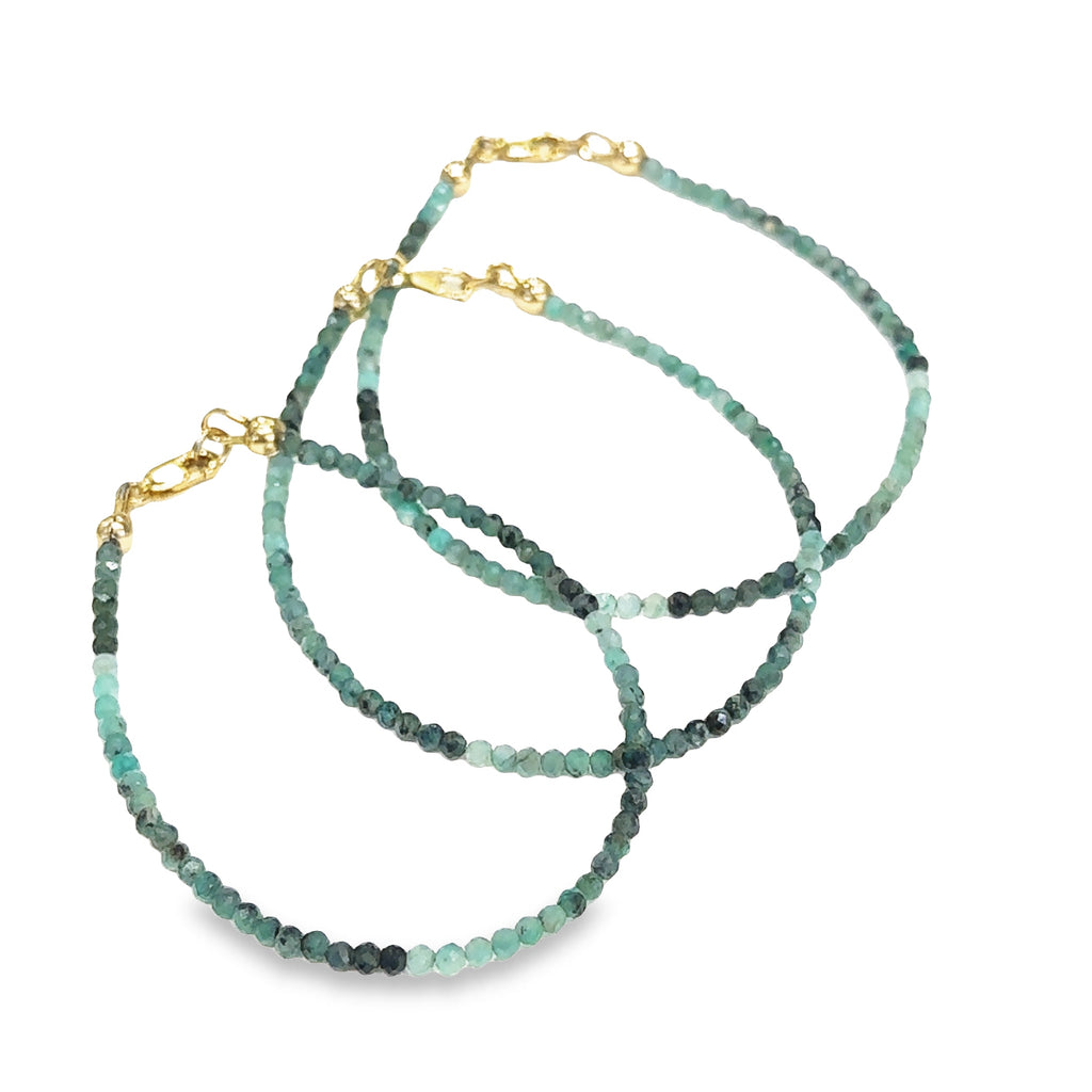 Handmade genuine Emerald gemstone bracelet with gold‑filled lobster clasp, available in 6.5'', 6.75'', and 7.25'' grouping on white front overview