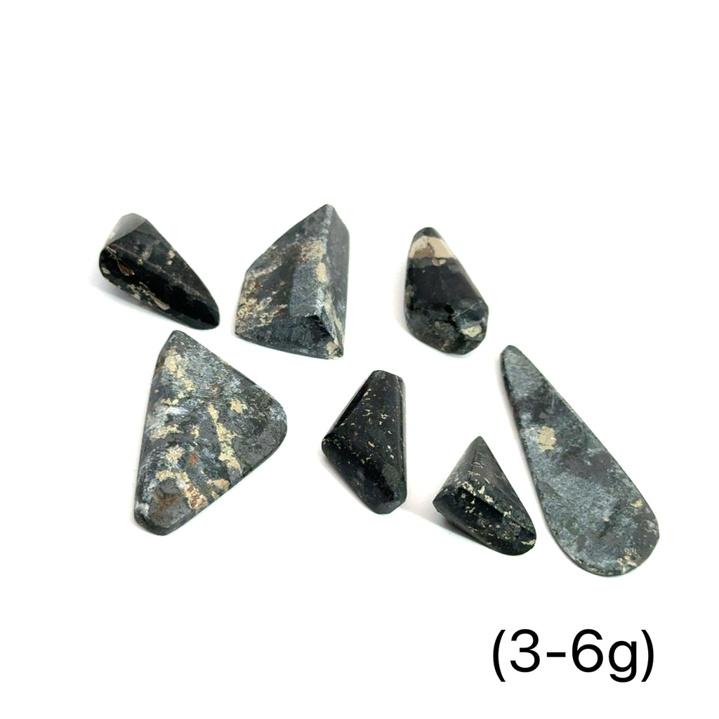 Healers Gold Tumbled Gemstone grouping (3-6g) on white overview