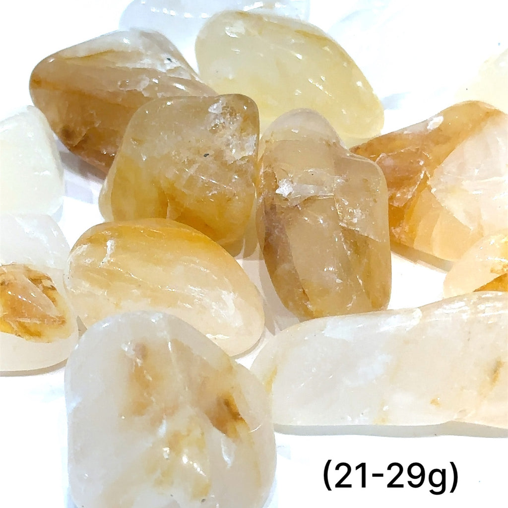 Healing Golden Healer Quartz crystal for chakra alignment and balance (21-29g) on white overview