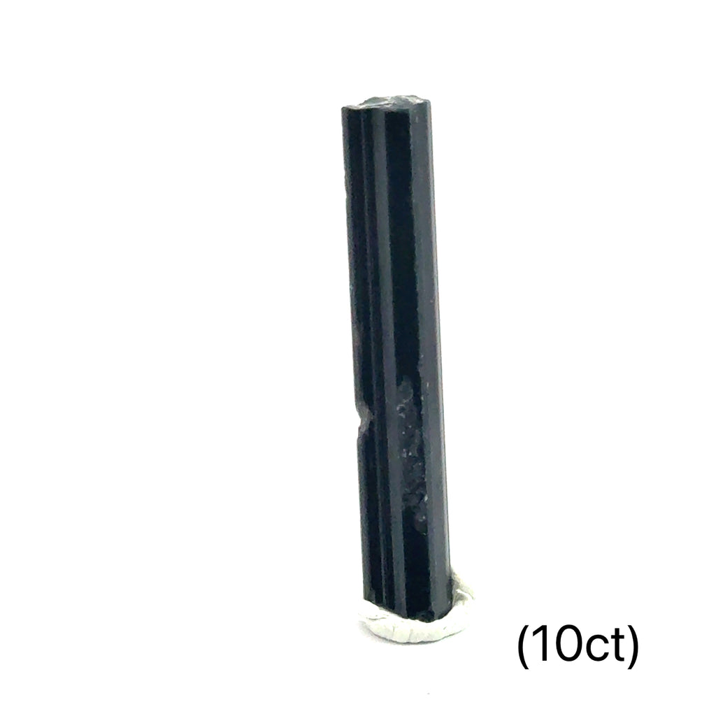 Healing Green Tourmaline crystal for strength, vitality, and wholeness (10ct) on white and in finger tips front view