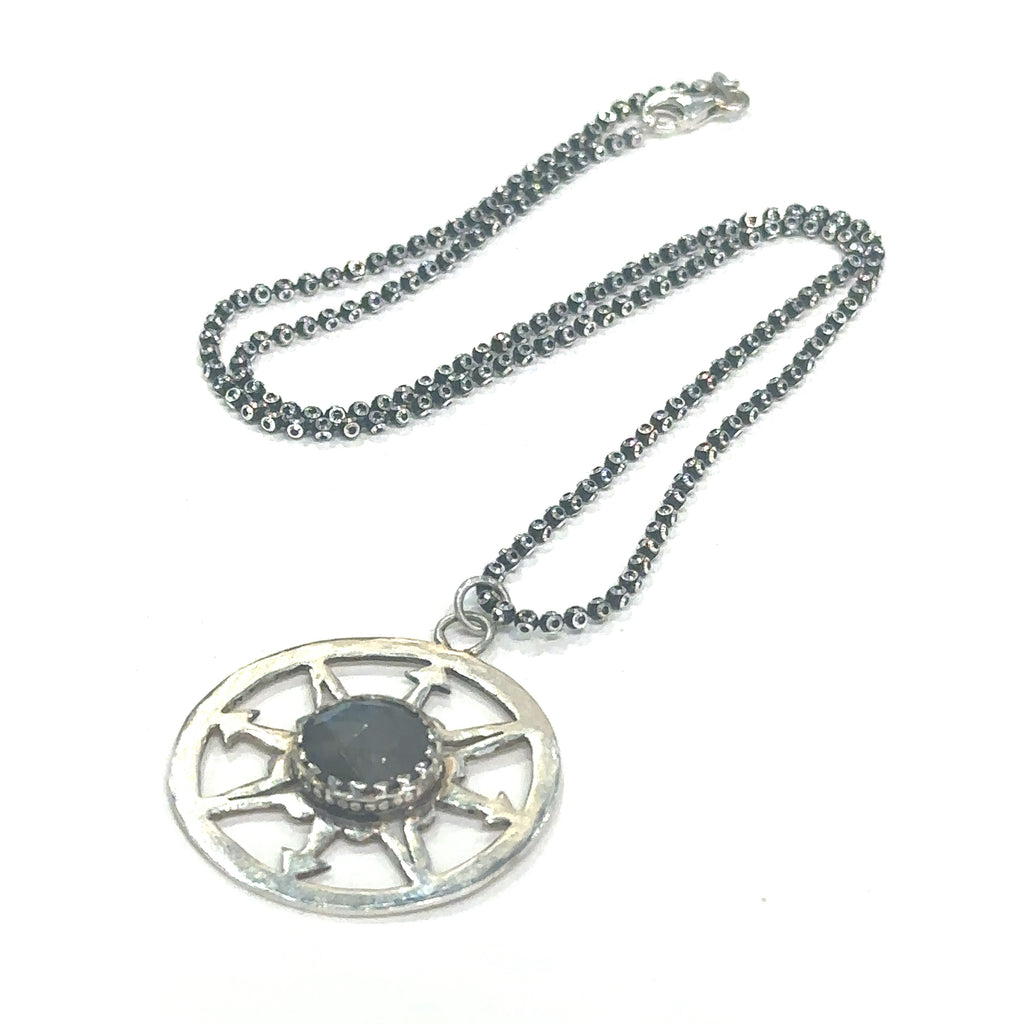 Healing Labradorite compass pendant necklace for chakra alignment and spiritual connection on white center long overview