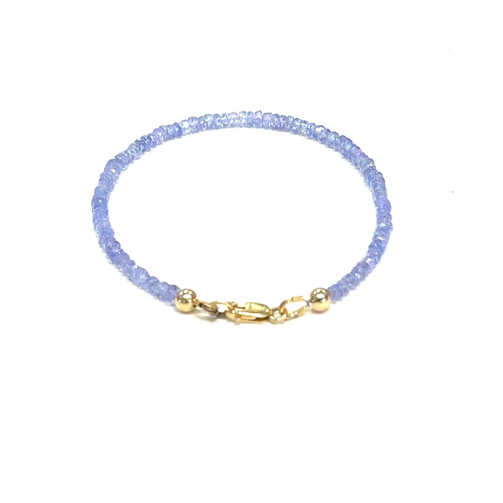 Healing Tanzanite gemstone bracelet handcrafted in Boston, Massachusetts
on white back overview