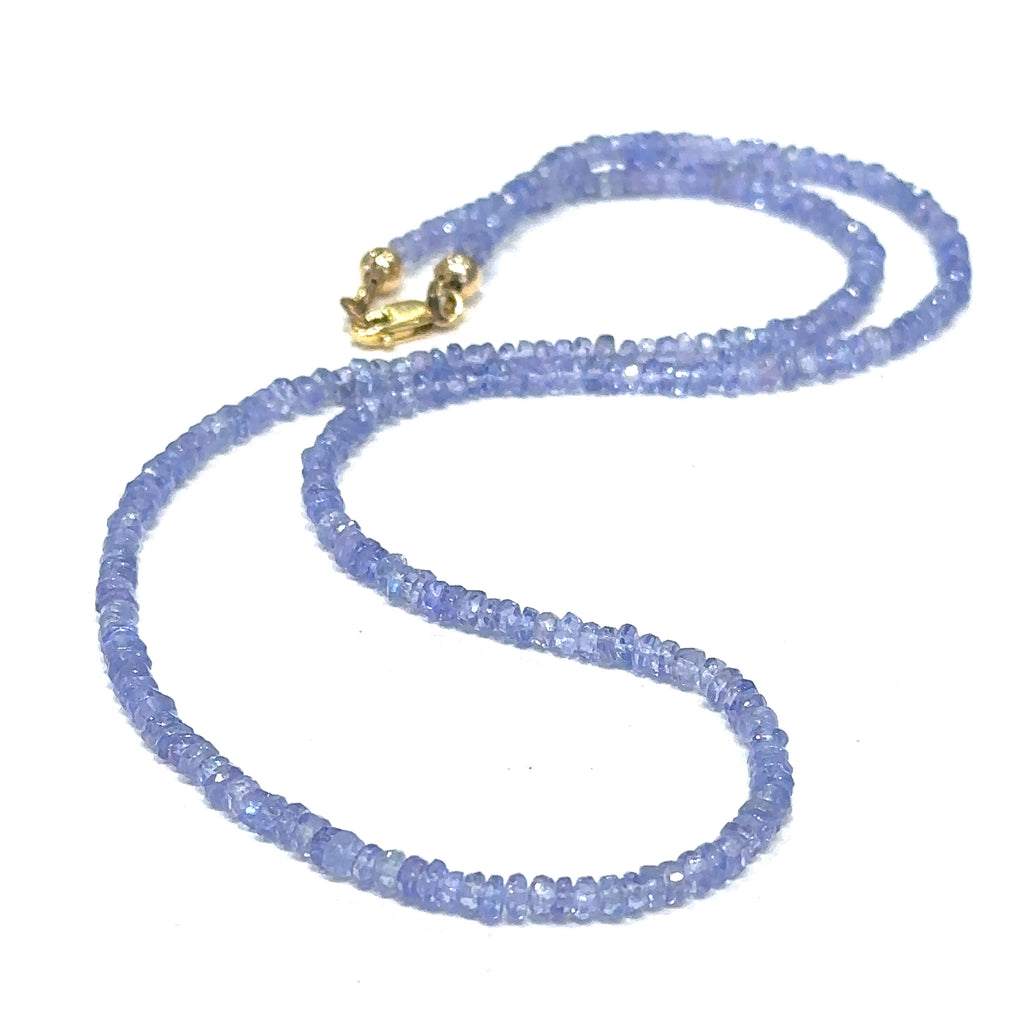 Healing Tanzanite gemstone necklace handcrafted in Boston, Massachusetts
 on white center long overview