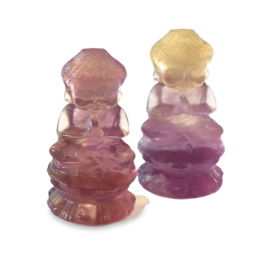 Healing fluorite Buddha statue for clarity, intuition, and creativity grouping on white front view