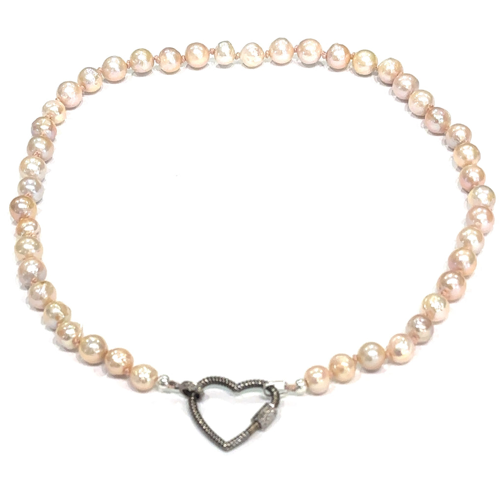 Healing pearl jewelry symbolizing purity, wisdom, and emotional balance on white center overview 