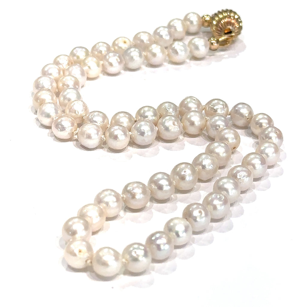 Healing pearl necklace symbolizing purity, wisdom, and emotional balance on white long center overview