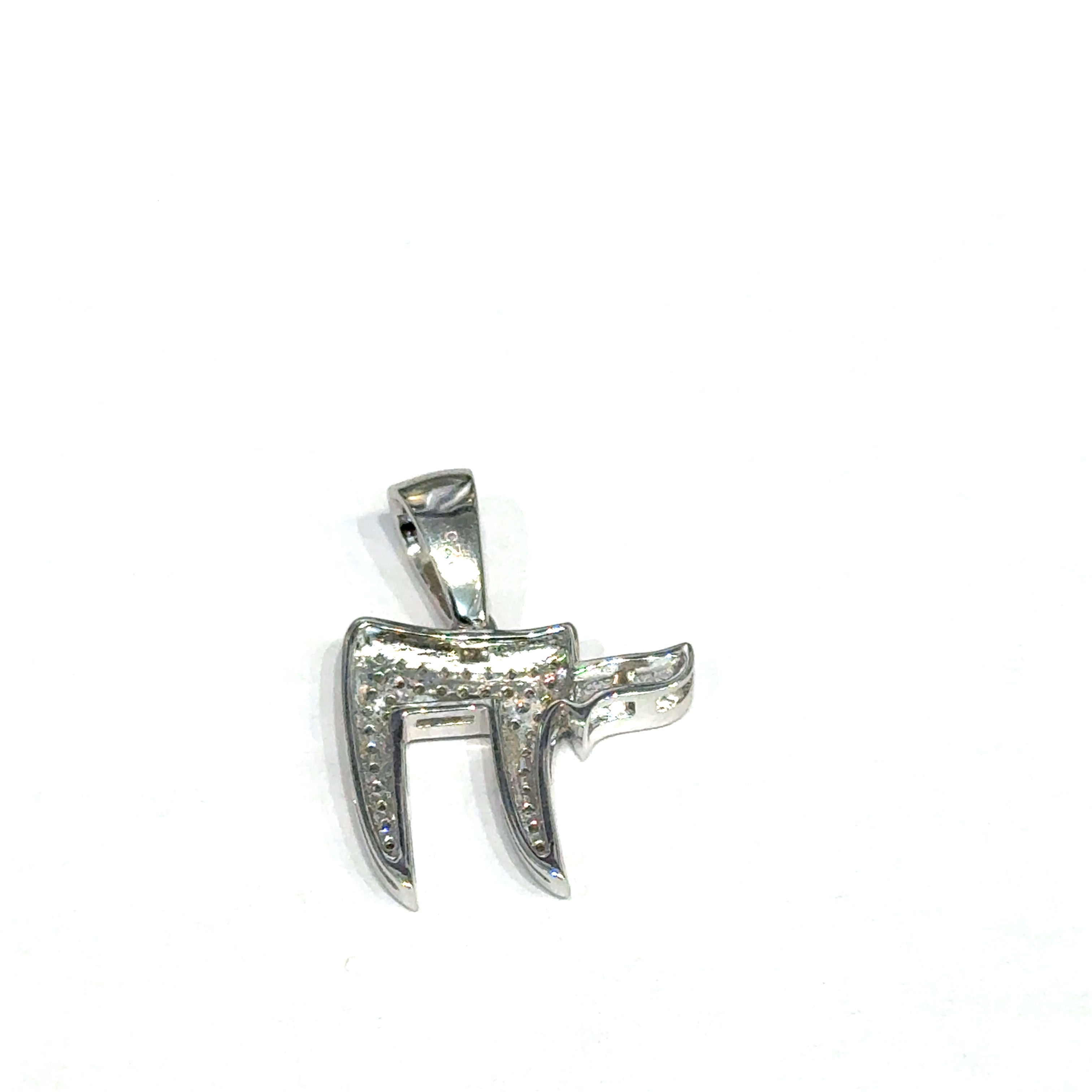 Hebrew Chai life symbol pendant in polished sterling silver with paved CZ detail on a white background, back overview. 