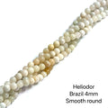 Heliodor Gemstone Strand 4mm smooth round 15'' on white front view