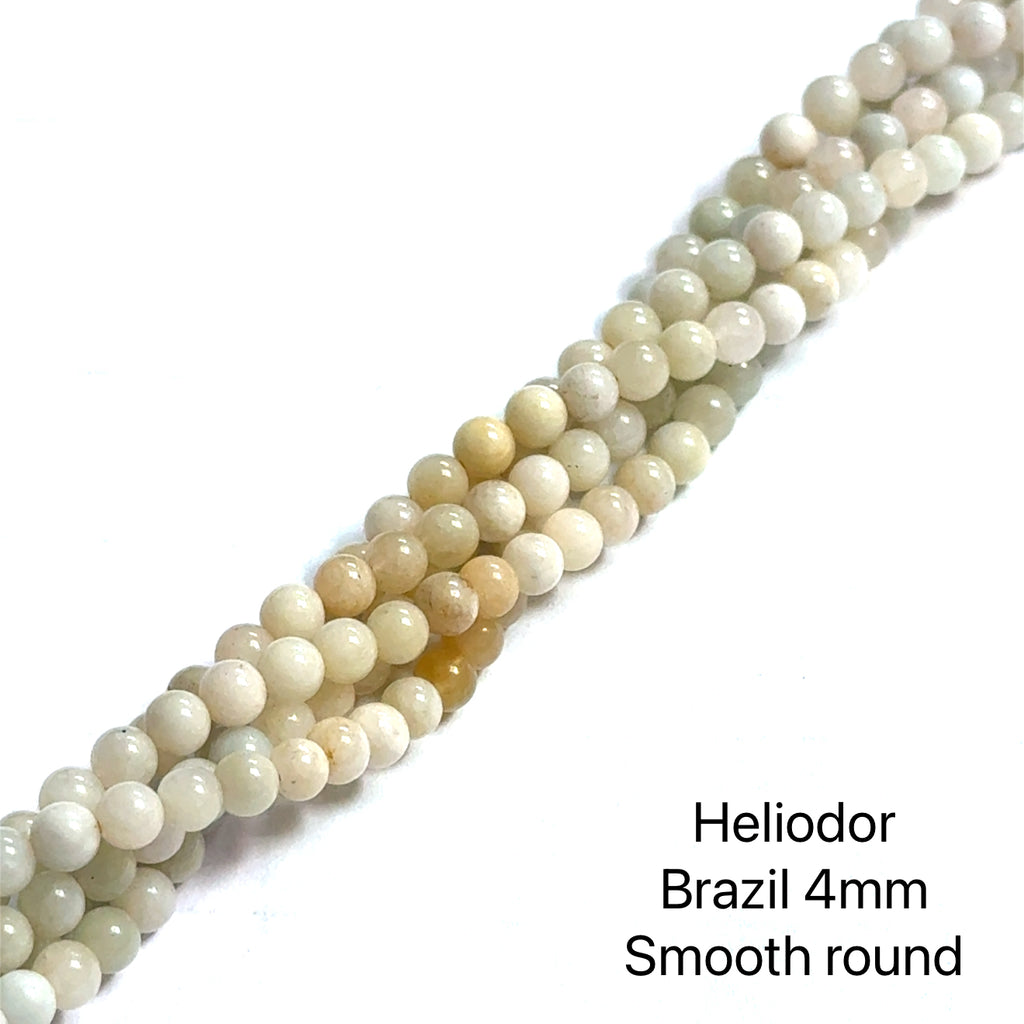 Heliodor Gemstone Strand 4mm smooth round 15'' on white front view