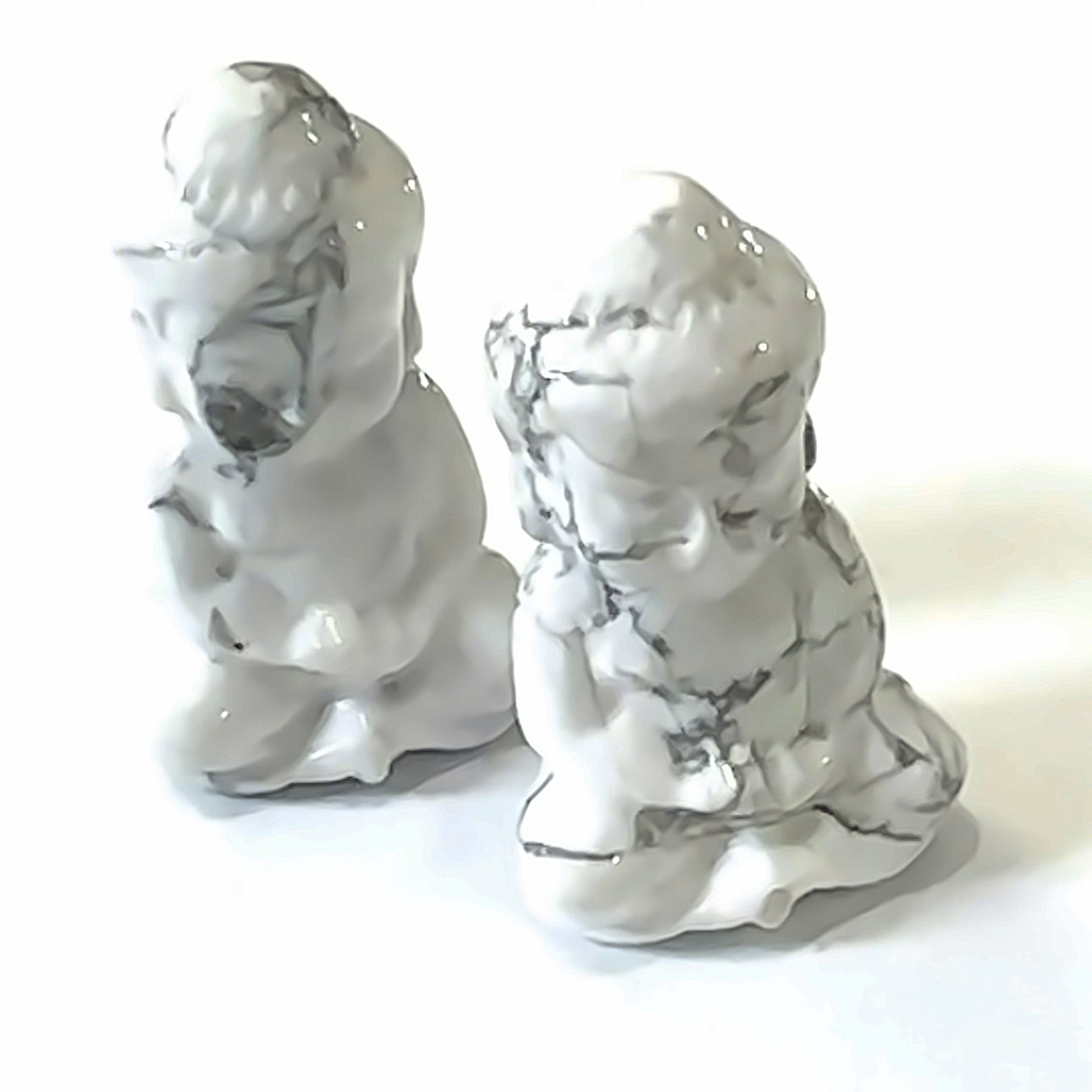 Howlite Gemstone Buddha grouping on white front overview