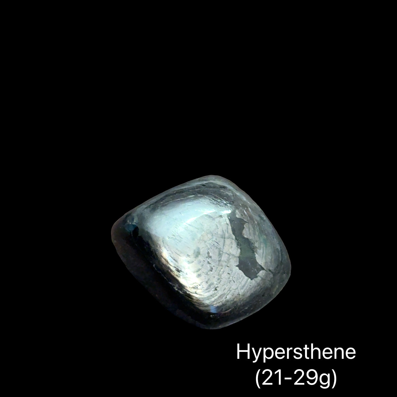 Hypersthene stone on a black background with the weight range indicated (21-29g), front view.