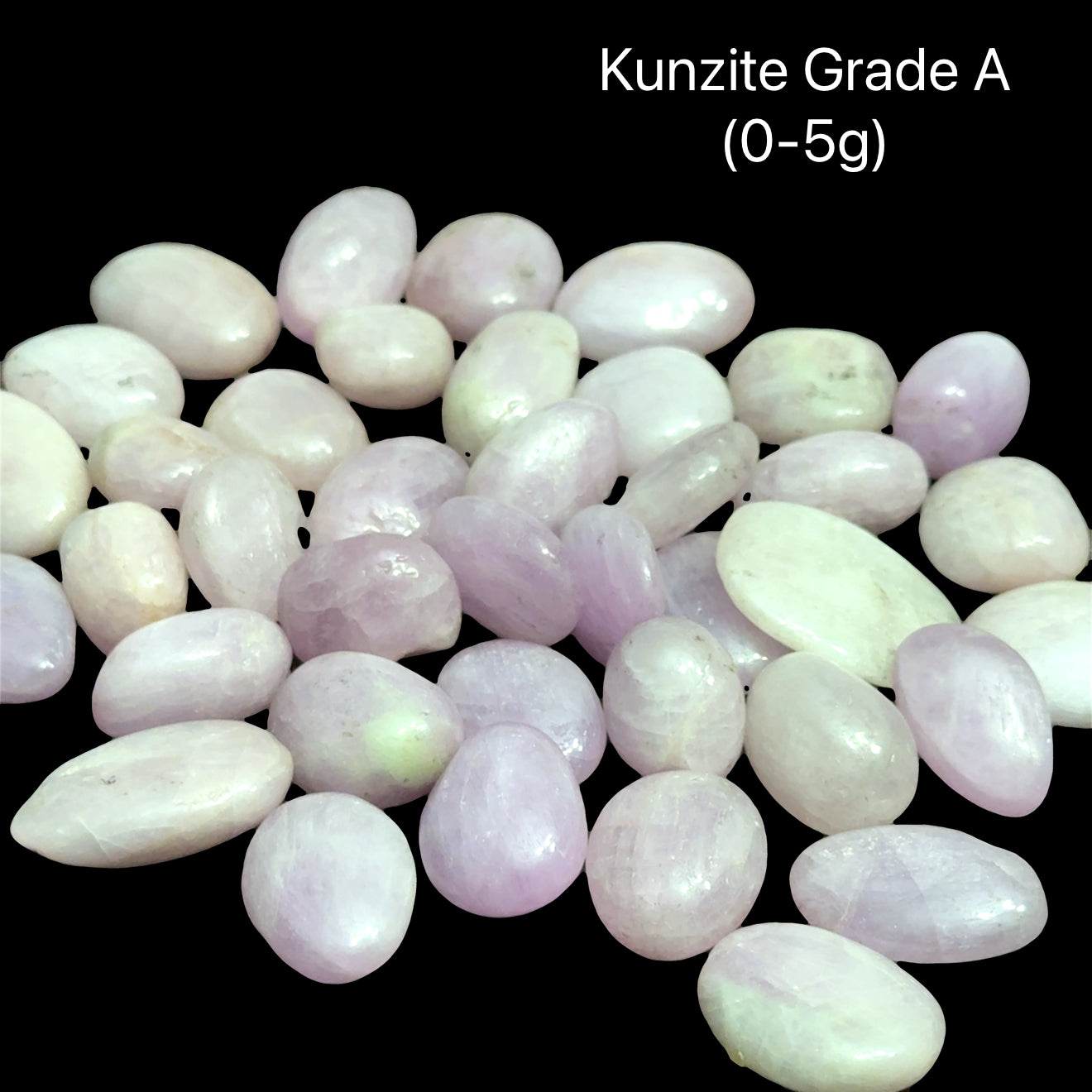 Kunzite Grade A stones on a black background with weight indication (0-5g), front view.