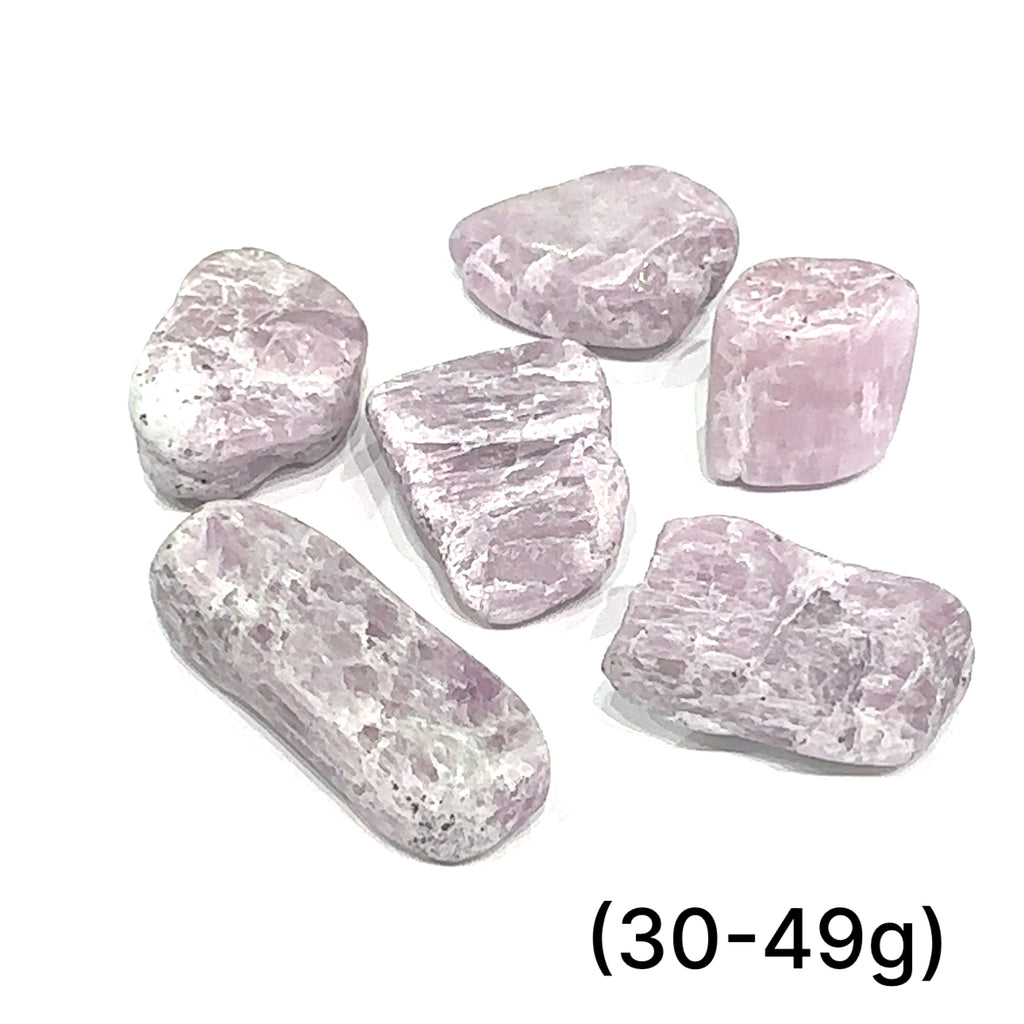 Kunzite Semi-Tumbled Gemstone grouping of (30-49g) on white overview