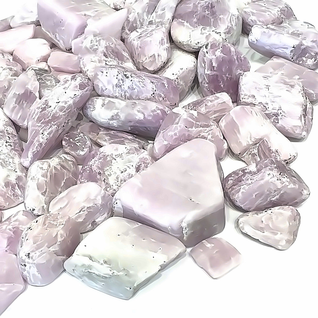 Kunzite Semi-Tumbled Gemstone grouping on white overview
