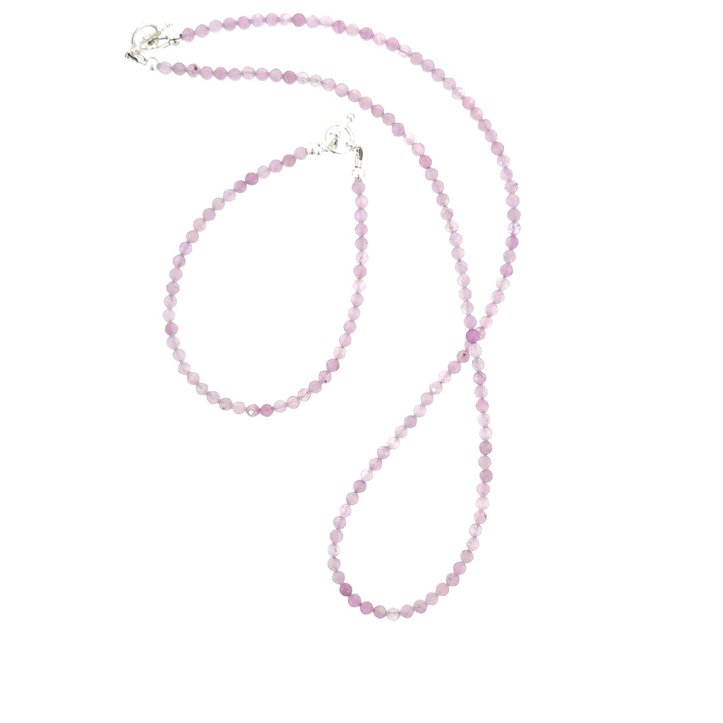 Kunzite micro-faceted bead necklace draped at collarbone paired with matching kunzite bracelets, handmade spiritual jewelry Hidden Jewel of the South End Boston