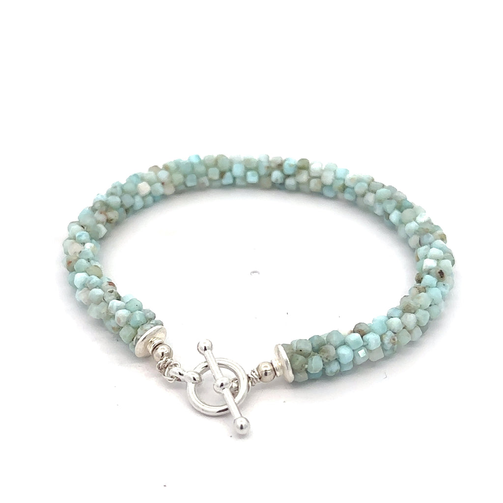 Larimar Gemstone Crocheted Bracelet on white bottom close up overview 