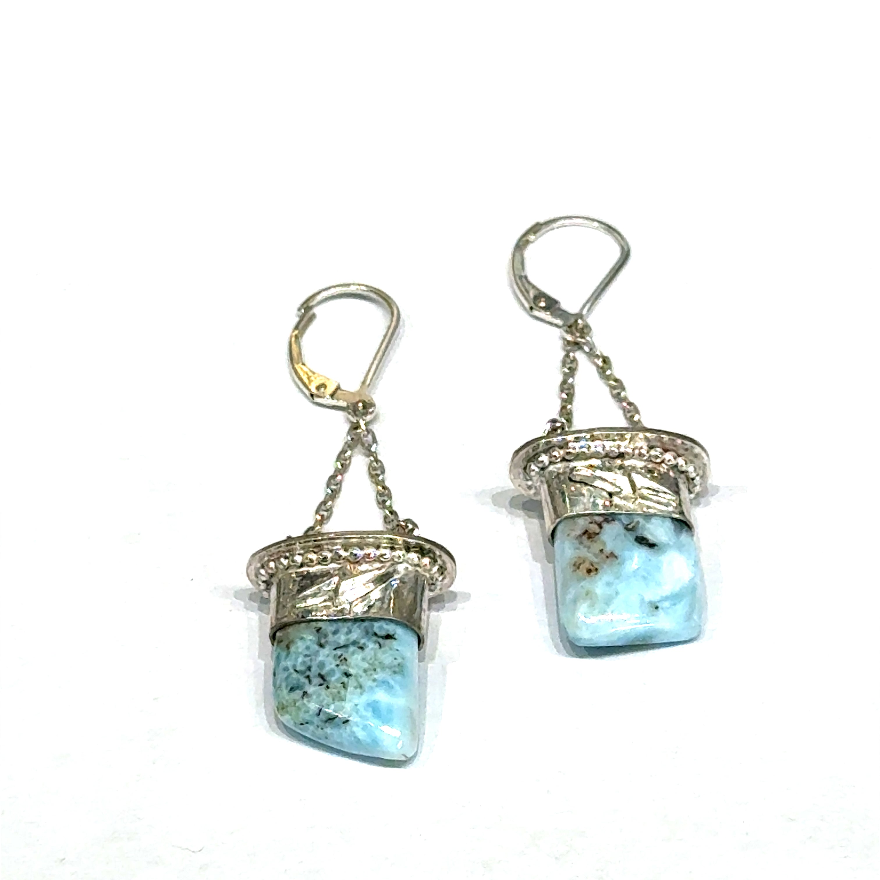 Larimar gemstone dangle earrings with lightning bolt sterling silver caps — handcrafted in Boston on a white background center front close up overview. 