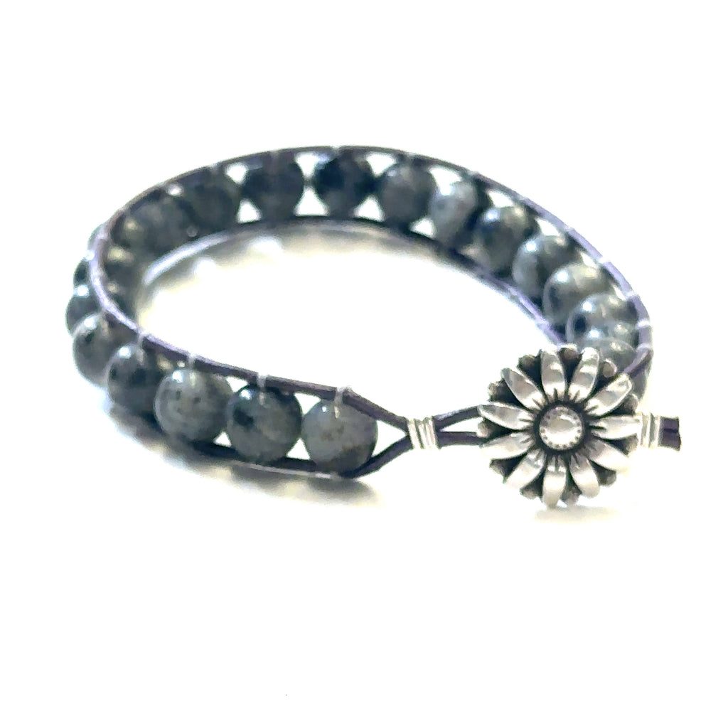 Larvikite (Labradorite) gemstone leather wrap bracelet with silver sunflower button, 7 inches long on white back overview