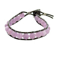 Lavender Jade leather wrap bracelet with 8mm purple beads on dark brown leather, silver decorative button, unisex spiritual jewelry, on a white background, front view.