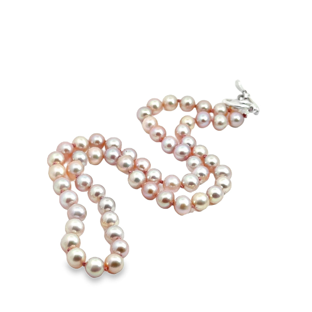 Light Pink Freshwater Pearl Necklace on white center diagonal overview